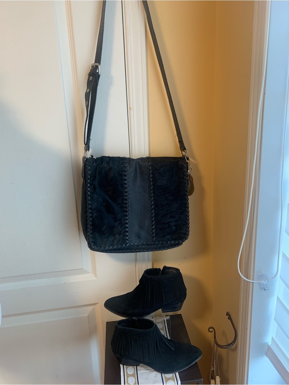 Black leather calf hair messenger bag braided